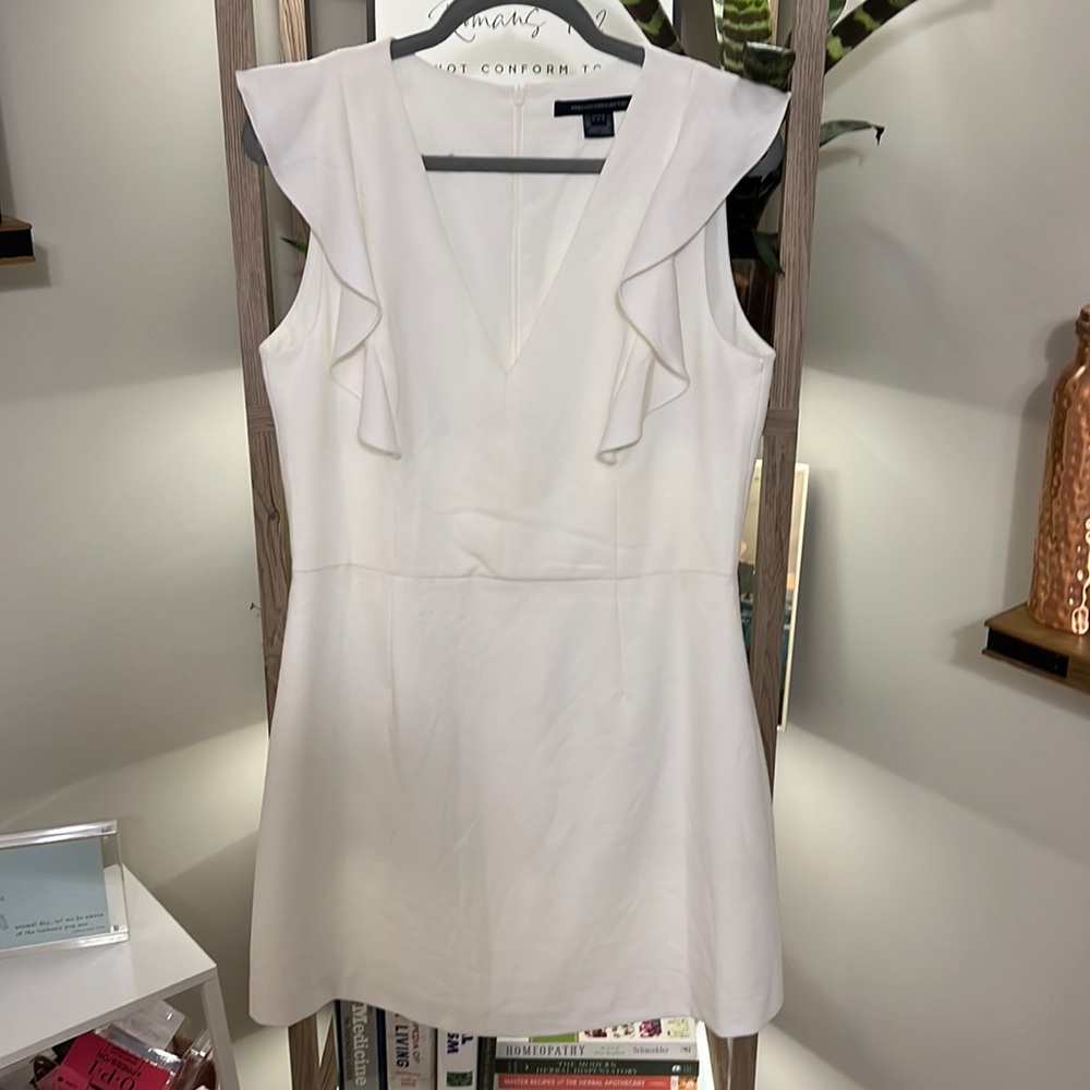 Stunning, sleeveless,white deep v-neck dress from French Connection. Size 12